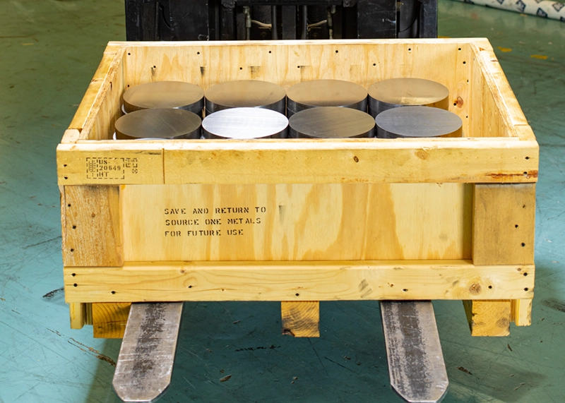 Metal forms in wood packaging on forklift for shipping